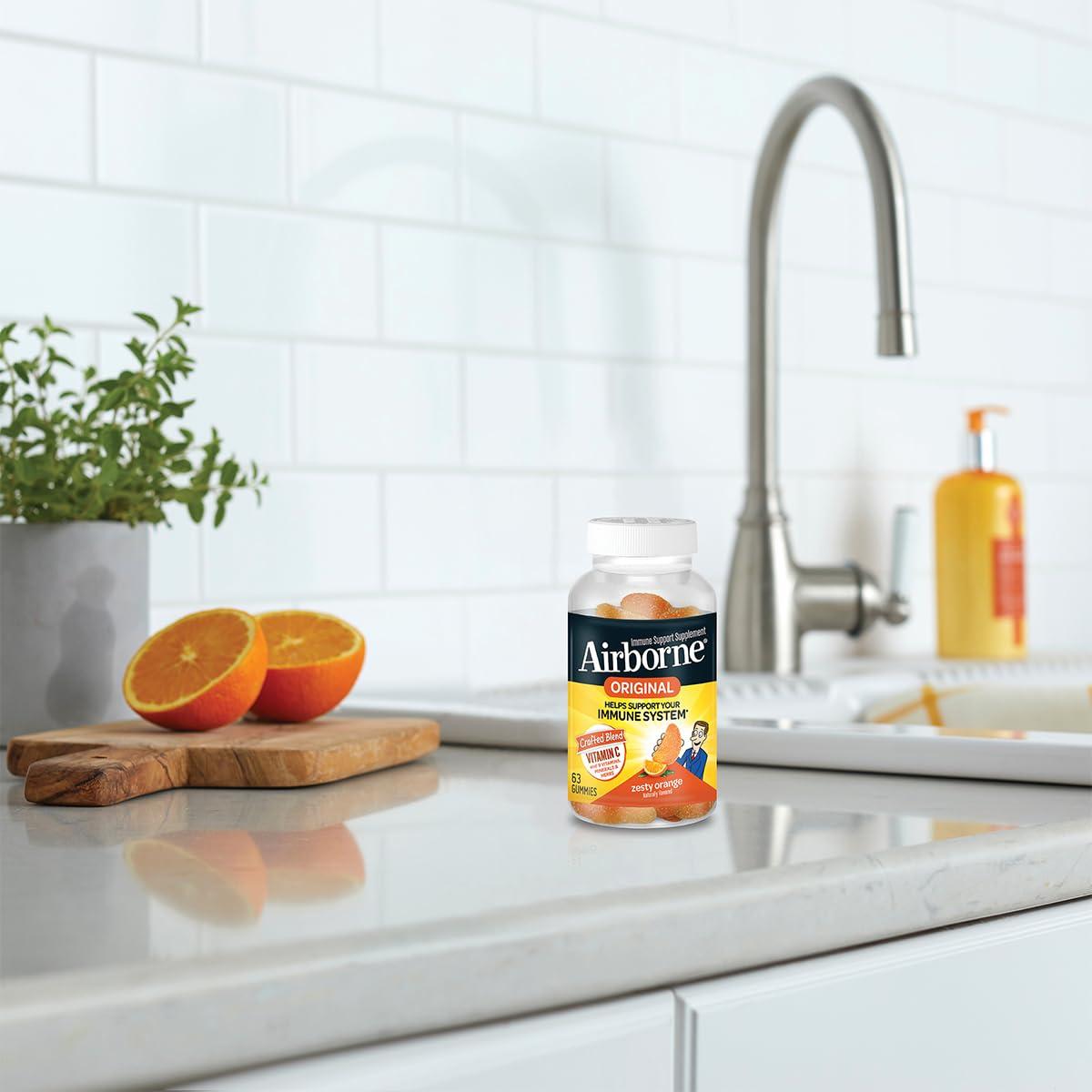 Airborne Airborne 750mg Vitamin C Immune Support Supplement Gummies for Adults, Zesty Orange Flavor, Gluten Free Crafted Blend with Powerful Antioxidants Vitamins A C & E, 63 Gummies (4 Pack)