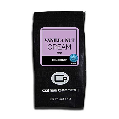 Coffee Beanery Vanilla Macadamia Nut Decaf Coffee by Coffee Beanery | 12oz Flavored Decaf Coffee Ground Medium Roast Coffee | 100% Specialty Arabica Coffee Ground | Gourmet Coffee | Flavored Fine Ground Coffee Medium Roast