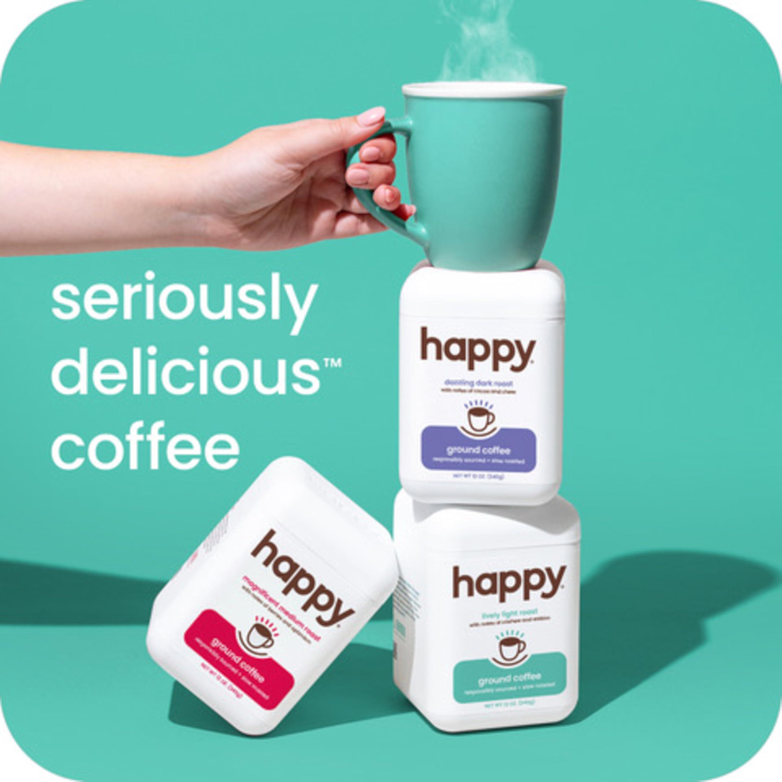 We Are Happy, LLC happy coffee light roast ground coffee, 12 oz., notes of cashew & elation, recyclable container, grown & harvested in Colombia, Brazil & Guatemala