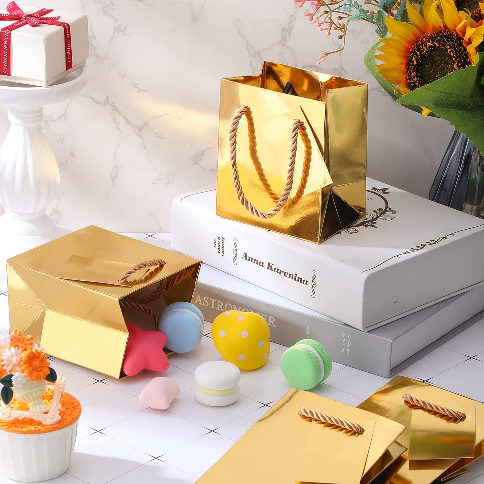 Nuanchu Nuanchu 50 Pcs Mini Gift Bags Bulk, 4 x 2.75 x 4.5 Inch Paper Bags with Gift Tags, Extra Small Metallic Paper Totes with Handles for Birthday Weddings Baby Showers Party Favors Gifts (Gold)