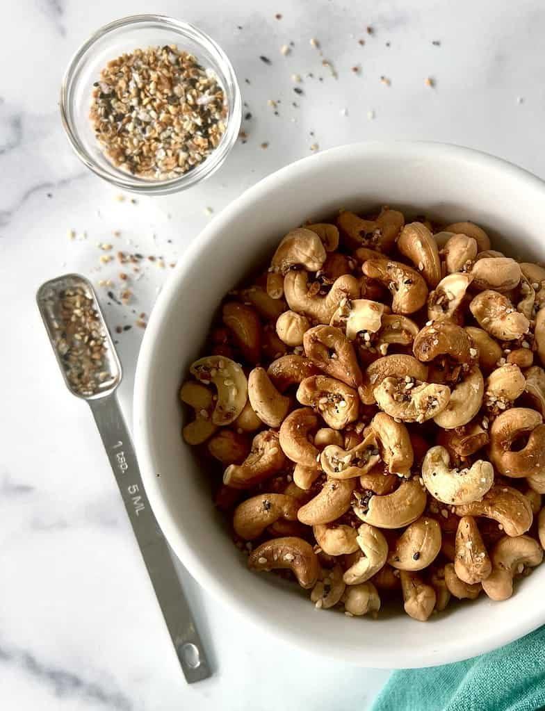GiftTree Encore Gourmet Gift Basket: Elevate the Moment with White Chocolate Lindor Truffles, Everything Bagel Cashews, Cranberry Crunch Mix, Bear Snack Mix, and Chocolate Drizzled Caramel Popcorn.