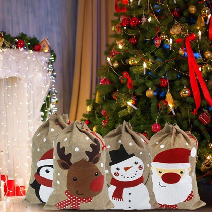 Hooin Christmas Sacks (13.8‘’ x 19.7‘’ Medium Size) – Pack of 4 Drawstring Goody Gift Bags for Christmas Treats 4 Designs Santa Snowman Reindeer Penguin