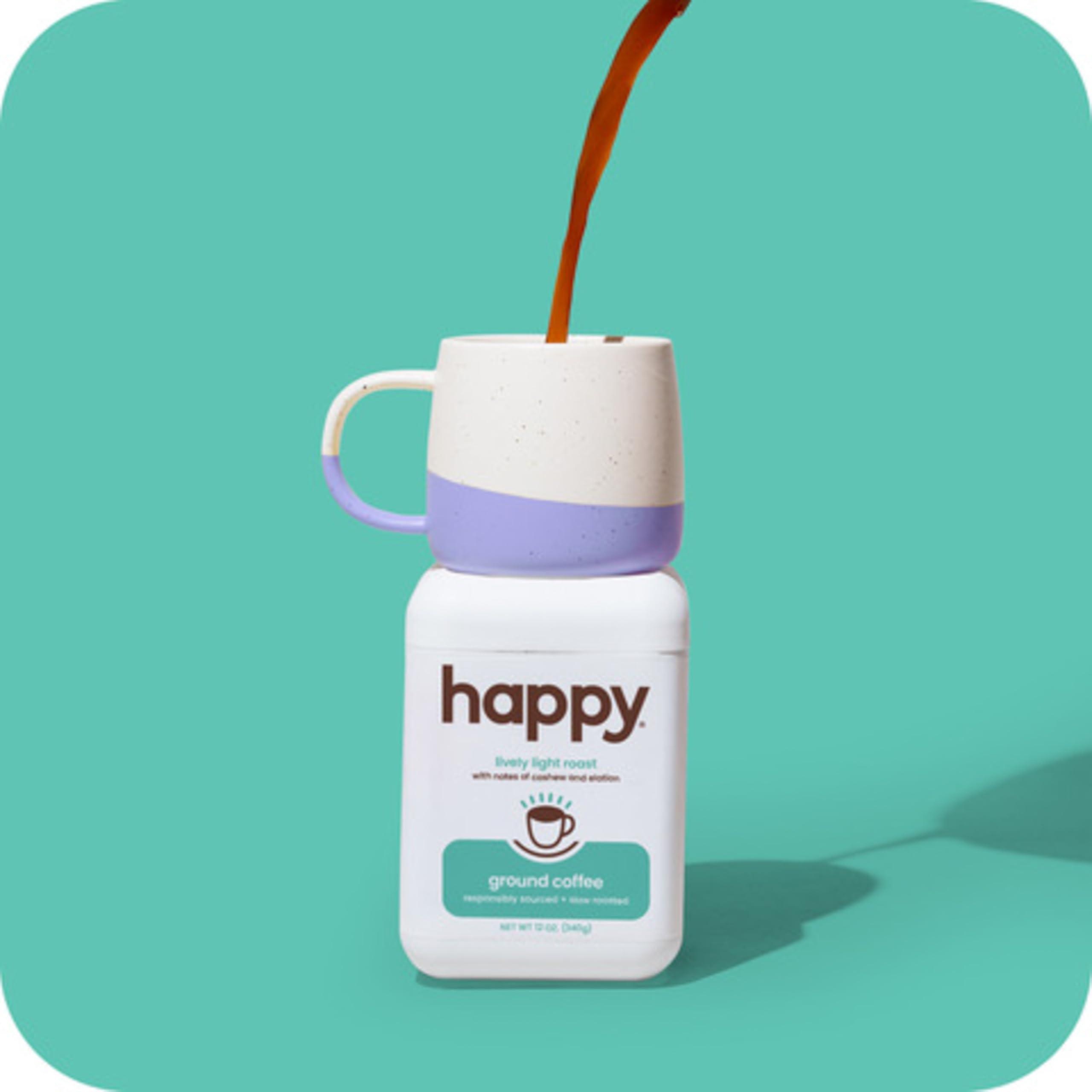 We Are Happy, LLC happy coffee light roast ground coffee, 12 oz., notes of cashew & elation, recyclable container, grown & harvested in Colombia, Brazil & Guatemala