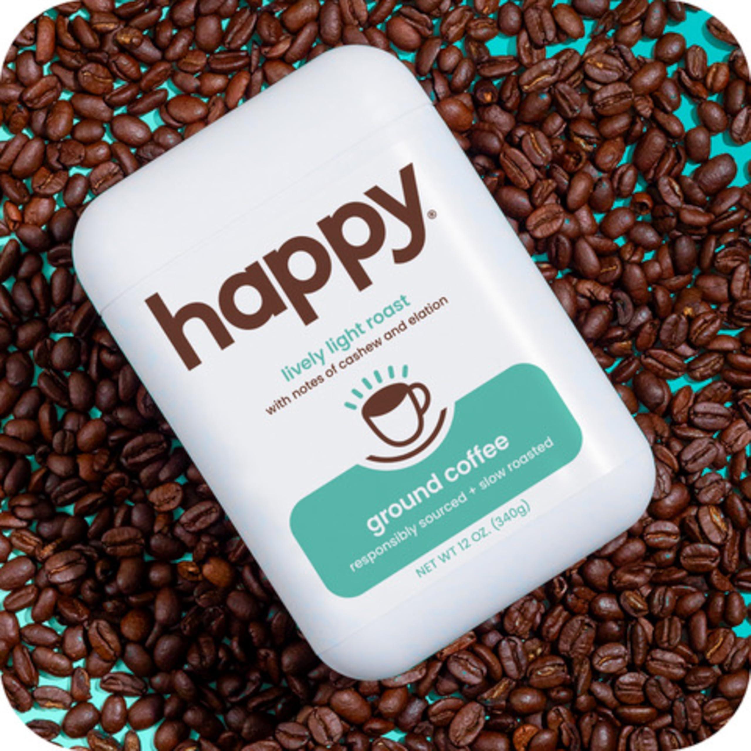 We Are Happy, LLC happy coffee light roast ground coffee, 12 oz., notes of cashew & elation, recyclable container, grown & harvested in Colombia, Brazil & Guatemala